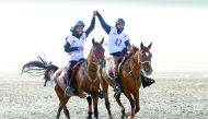 Saeed Hamad Saeed Juma (left) astride LP Hara, winning the 100km  CEIYJ* event of the National Day Endurance Ride, organised by the Qatar Endurance Committee at Endurance Village, Sealine, Mesaieed yesterday. 