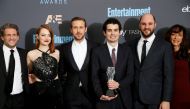 (L-R) Producer Gary Gilbert, actors Emma Stone and Ryan Gosling, director Damien Chazelle, producer Jordan Horowitz and costume designer Mary Zophres pose backstage with their award for Best Picture for 'La La Land