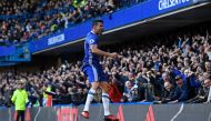 Chelsea's Brazilian-born Spanish striker Diego Costa celebrates after scoring the opening goal of the English Premier League football match between Chelsea and West Bromwich Albion at Stamford Bridge in London on December 11, 2016.  AFP / Justin TALLIS 