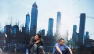 FILE PHOTO: Workers rest outside a construction site in Beijing's central business district, China, July 15, 2016. REUTERS/Jason Lee