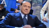 (FILES) This file photo taken on May 21, 2014 shows Italian former Prime Minister Silvio Berlusconi posing for photographers before the 