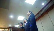 Lee Joong-Hwan (centre), a lawyer for South Korea's embattled President Park Geun-hye, gives a briefing after submitting a defence at the Constitutional Court in Seoul, yesterday. 