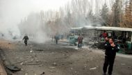 People react after a bus was hit by an explosion in Kayseri, Turkey, December 17, 2016. Turan Bulut/ Ihlas News Agency via REUTERS 