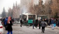 People react after a bus was hit by an explosion in Kayseri, Turkey, December 17, 2016. (Turan Bulut/Ihlas News Agency via REUTERS)