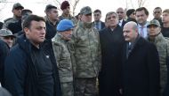 Turkey's Chief of Staff General Hulusi Akar, accompanied by former President Abdullah Gul and Interior Minister Suleyman Soylu, visits the scene of the blast in Kayseri, Turkey December 17, 2016. Turkish Military/Handout via REUTERS