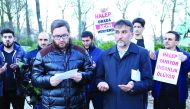 People gather outside Syrian Embassy in Brussels yesterday to protest against Assad regime forces’ and its supporters’ attacks on civilians and the humanitarian plight in Aleppo. 