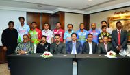 The captains of the teams taking part in the 3rd Nation Cup cricket tournament pose for a picture with S Sreesanth and members of the organising committee. Picture by: Abdul Basit / The Peninsula