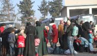 Civilians evacuated from the east part of Aleppo that had been under siege by Assad Regime forces and its supporter foreign terrorist groups, arrive Syria's Rashidin area on December 19, 2016. ( Firas Faham - Anadolu Agency )

