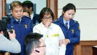 Choi Soon-sil, a long-time friend of President Park Geun-hye arrives for her first court hearing in Seoul, yesterday.