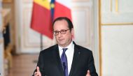 French president Francois Hollande speaks during a joint statement with Senegal president at the Elysee palace, on December 20, 2016, in Paris, during his two days state visit in France. / AFP / POOL / ALAIN JOCARD
