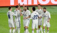 Real Madrid's forward Cristiano Ronaldo (2nd R) celebrates with his teammates after his third goal against Kashima Antlers during the Club World Cup football final match between Kashima Antlers of Japan and Real Madrid of Spain at Yokohama International s