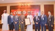 QIIB officials at the event at the bank headquarters at the Grand Hamad Street.