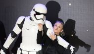 Carrie Fisher poses for cameras as she arrives at the European Premiere of Star Wars, The Force Awakens in Leicester Square, London, December 16, 2015. REUTERS/Paul Hackett/File Photo