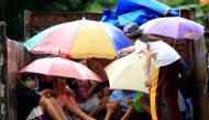 Young residents sit in a truck after the local government implemented preemptive evacuations at Barangay Matnog, Daraga, Albay province on December 25, 2016, due to the approaching typhoon Nock-Ten. Babies, toddlers and old people were loaded onto militar