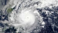 This December 25, 2016 NASA satellite images shows Super Typhoon Nock-ten (30W) over the Philippines. A powerful typhoon with gusts of up to 235 kilometres (146 miles) an hour hit the Philippines late Sunday, disrupting Christmas celebrations for tens of 