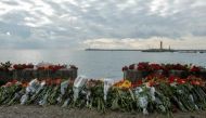 Flowers in memory of passengers and crew members of Russian military Tu-154, which crashed into the Black Sea on its way to Syria on Sunday, are placed at an embankment in the Black Sea resort city of Sochi, Russia, December 26, 2016. REUTERS/Maxim Shemet