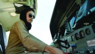This 2015 file photograph shows Afghanistan's first female pilot Niloofar Rahmani sitting in a fixed-wing Afghan Air Force aviator aircraft at an airfield in Kabul.