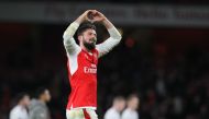 Arsenal's French striker Olivier Giroud celebrates at the final whistle in the English Premier League football match between Arsenal and West Bromwich Albion at the Emirates Stadium in London on December 26, 2016. AFP / IAN KINGTON