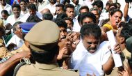 Members of the All India Anna Dravida Munnertra Kazhagam (AIADMK) preventing Rajya Sabha member Sasikala Pushpa's husband Lingeswara Thilagan from entering the party's office in Chennai, yesterday.