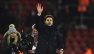 Tottenham Hotspur's Argentinian head coach Mauricio Pochettino waves at the end of the English Premier League football match between Southampton and Tottenham Hotspur at St Mary's Stadium in Southampton, southern England on December 28, 2016.  AFP / Glyn 