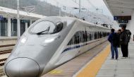 A high-speed railway train linking Shanghai and Kunming, of Yunnan province, is seen at a station during a partial operation, in Anshun, Guizhou province, China, December 28, 2016. Picture taken December 28, 2016. REUTERS/Stringer