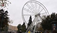 Workers dismantle Athens Ferris wheel at the central Syntagma Square on December 29, 2016. A senior Athens official has resigned in an unprecedented fiasco over a Ferris wheel that was erected for Christmas but then dismantled before ever operating over s