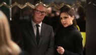 (FILES) This file photo taken on March 18, 2016 shows Fashion designer Victoria Beckham (R), being interviewed in her new fashion store which is opening at the Landmark in the Central district of Hong Kong. AFP / ISAAC LAWRENCE
