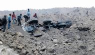 People gather near the site of a coal mine collapse near Lalmatia in Godda district, in eastern Jharkhand state on December 30, 2016. AFP / STRINGER
