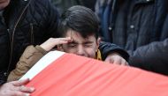 Relatives of Istanbul nightclub terror attack victim Ayhan Arik attend his funeral ceremony on January 01, 2017 in Istanbul, Turkey. (Berk Özkan - Anadolu Agency)