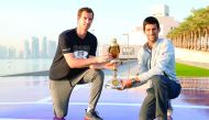 World’s top two ranked players, Andy Murray and Novak Djokovic, pose for a photograph with the Qatar ExxonMobil Open trophy, in front of the iconic Museum of Islamic Art  in Doha. The ATP event is organised by Qatar Tennis Federation.