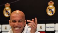 Real Madrid's French coach Zinedine Zidane smiles during a press conference. (AFP / GERARD JULIEN)
