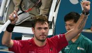 Stan Wawrinka of Switzerland celebrates his victory against Viktor Troicki of Serbia in the men's second round at the Brisbane International tennis tournament in Brisbane on January 4, 2017.  AFP / SAEED KHAN