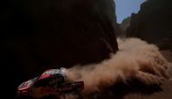 Nasser Al-Attiyah of Qatar drives his Toyota with his copilot Matthieu Baumel. (REUTERS/Ricardo Moraes)