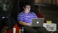 The new labour law in a country famous for its tightly regulated workplace was prompted by the blurring of the boundary between work and private life by new technology and ways of working. (Reuters file photo) 