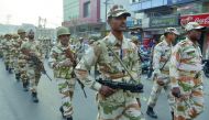 Paramilitary forces patrol along a road in Amritsar yesterday as part of election security.