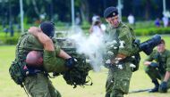 Russian marines show their skills during a demonstration at a park in Manila, yesterday. 