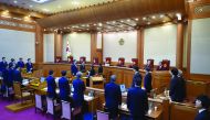 Nine judges of South Korea's Constitutional Court during a hearing on whether to confirm the impeachment of President Park Geun-hye, at the court in Seoul, yesterday.