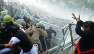 Police using a water cannon to disperse demonstrators during a protest organised by Congress party against demonetisation, in Chandigarh, yesterday.