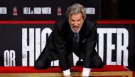 Actor Jeff Bridges places his handprints in cement during a ceremony in the forecourt of the TCL Chinese theatre in Hollywood, California U.S., January 6, 2017. REUTERS/Mario Anzuoni
