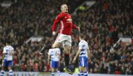  Manchester United's Wayne Rooney celebrates scoring their first goal. (Reuters / Darren Staples Livepic)