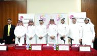 Sheikh Khalifa bin Jassim Al Thani (fourth left), Chairman, QC; with Dr Hassan Rashid Al Derham (third left), President, QU; Abdulaziz bin Nasser Al Khalifa (third right), CEO, QDB; and other officials at the signing ceremony held at Qatar Chamber yesterd