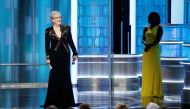 Actress Meryl Streep (L) accepts the Cecil B DeMille Award from presenter Viola Davis during the 74th Annual Golden Globe Awards show in Beverly Hills, California, U.S., January 8, 2017. Paul Drinkwater/Courtesy of NBC/Handout via REUTERS
