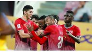 Lekhwiya players celebrate after scoring a goal against Al Gharafa in the Qatar Stars League match at Lekhwiya Stadium yesterday. Lekhwiya won 3-1. Pictures: Kammutty VP/The Peninsula