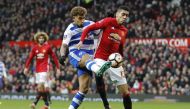 Manchester United's Chris Smalling in action with Reading's Daniel Williams. (Reuters / Darren Staples Livepic)