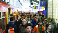 Commuters arrive into London Waterloo station in London yesterday after strike action by Southern Rail caused another morning of travel disruption. Commuters heading into London were hit by another strike on Southern rail, which caused virtually all servi