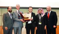 Dr Konstantinos E Kakosimos (third left), Assistant Professor, TEXAS A & M University, Qatar (TAMUQ), presenting a memento to Dr Michael Ladisch of Purdue University, USA; during the opening of the QAFCO -TAMUQ Conference on Water, Energy and Food Nexus, 