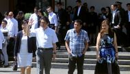 Japan's Prime Minister Shinzo Abe (2nd L), his wife, Akie Abe (L), Philippine President Rodrigo Duterte (2nd R), and his partner, Honeylet Avancena, walk towards the garden area of Waterfront Insular Hotel in Davao City, southern Philippines January 13, 2