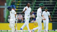 South African bowler Kagiso Rabada (centre) celebrates after bowling out Sri Lankan  batsman Kusal Mendis during the third Test at Wanderers Cricket Stadium in Johannesburg yesterday.