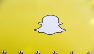 FILE PHOTO: A billboard displays the logo of Snapchat above Times Square in New York March 12, 2015. REUTERS/Lucas Jackson/File Photo

