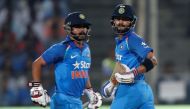  India's captain Virat Kohli (R) and his teammate Kedar Jadhav run between the wickets. (REUTERS/Danish Siddiqui)